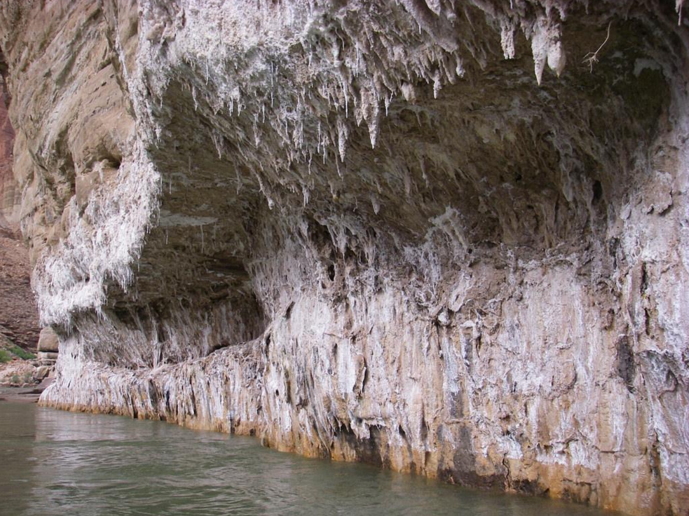 Salt formations accumulate on a Tapeats sandstone cave along the Little Colorado Ricer, a tributary of the Colorado River which runs through the iconic Grand Canyon. These salts are harvested and used by Native Americans.