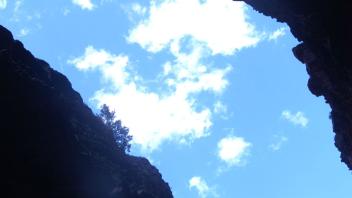 Looking up to sky in canyon